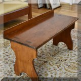 F45. Antique bench with low back. 